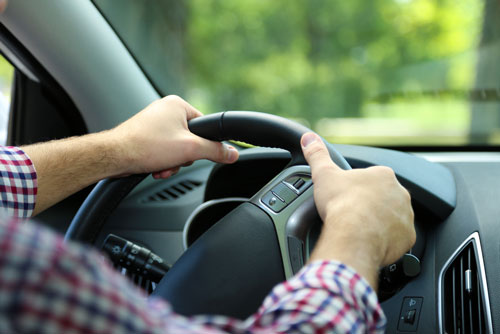 Man Driving a Car