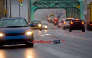 Photo of Cars on the Road with the Northwest Auto Center Logo