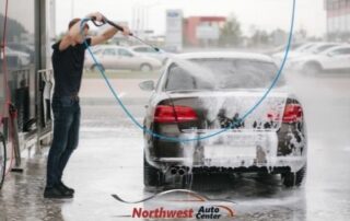 Man Cleaning His Car, Northwest Auto Center