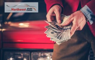 Image of Man in Front of Car Holding Cash, Car Value