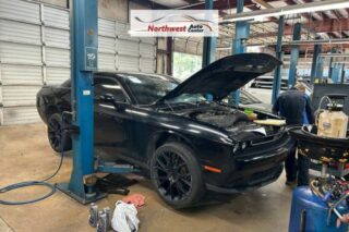 Image of Black Dodge Charger in Auto Shop