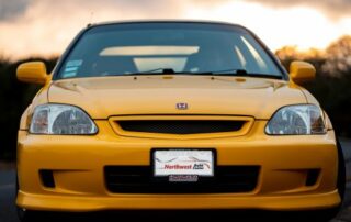 Image of Older Yellow Honda