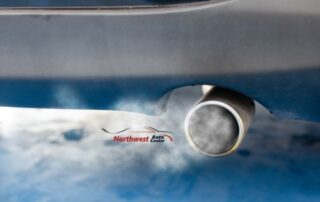 Image of smoke coming from car exhaust pipe